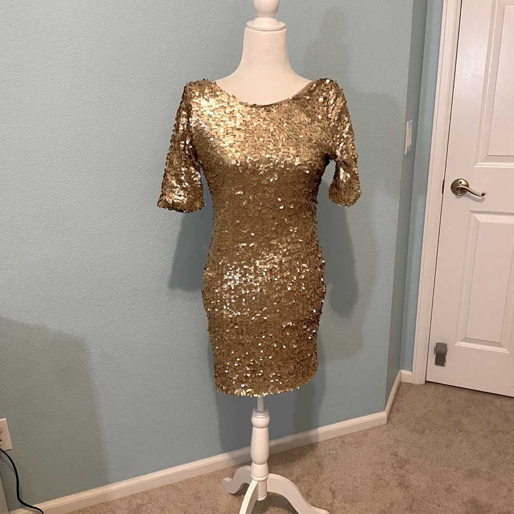 NWOT. Gold sequin mini dress with sleeves